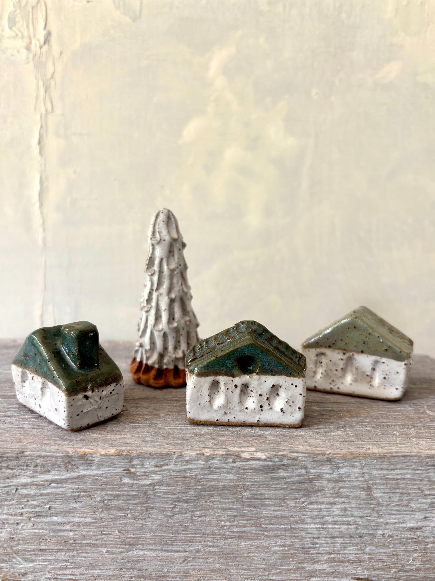 A village of cute tiny cottages paired with a charming little tree (55-19)