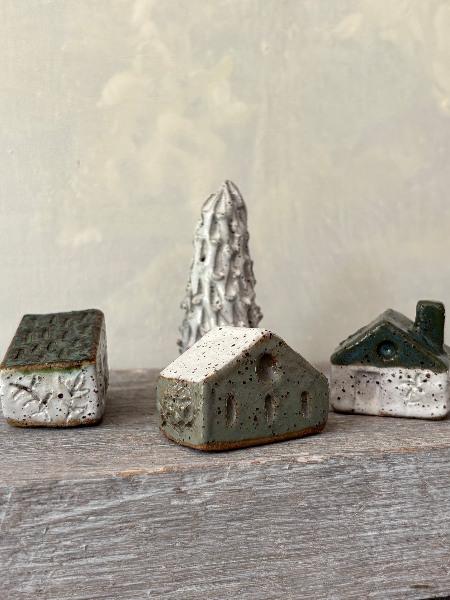 A village of cute tiny cottages paired with a charming little tree (55-18)