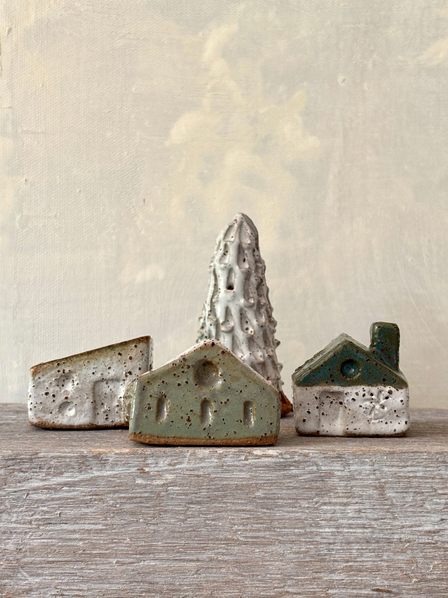 A village of cute tiny cottages paired with a charming little tree (55-18)