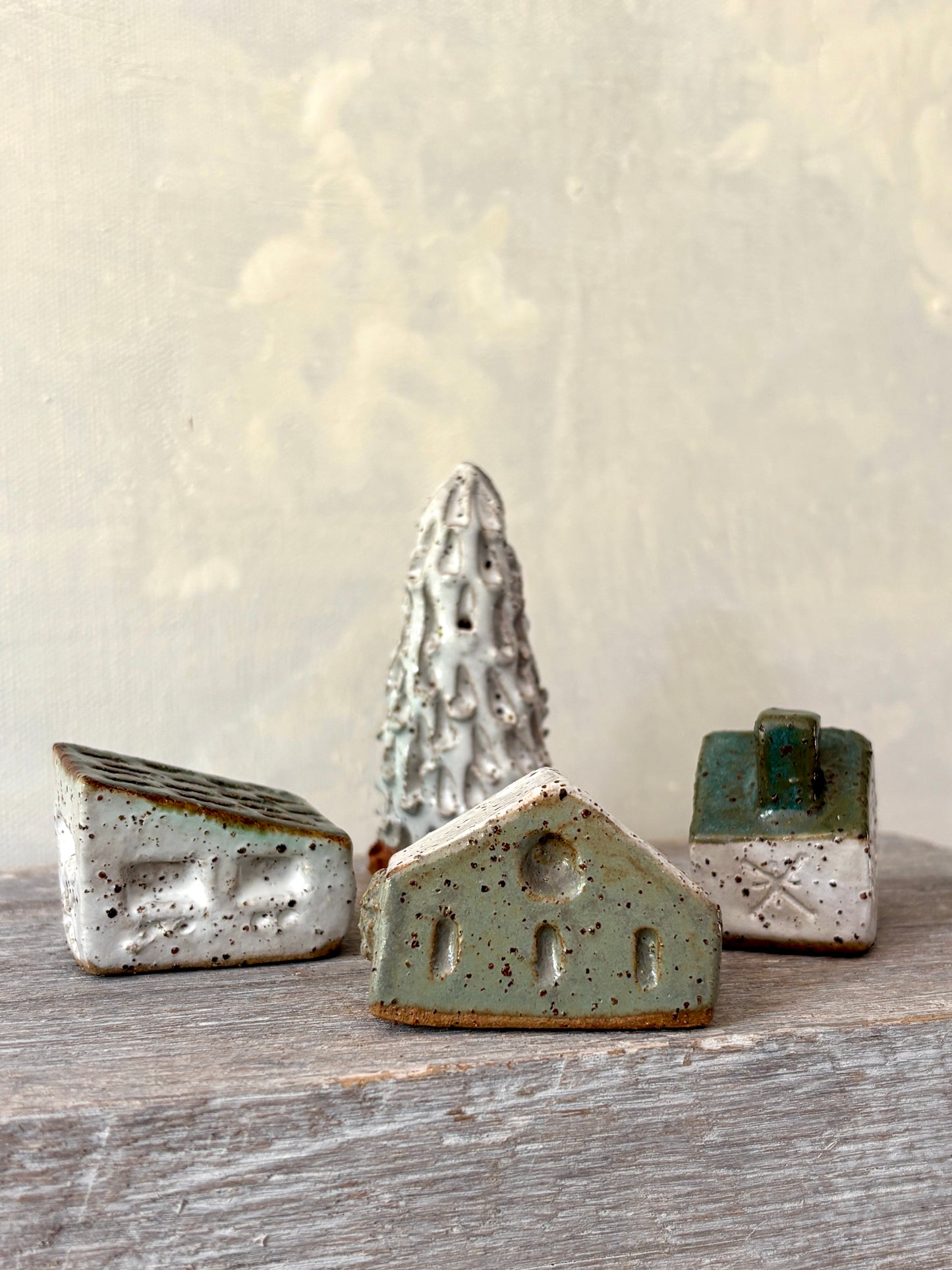 A village of cute tiny cottages paired with a charming little tree (55-18)